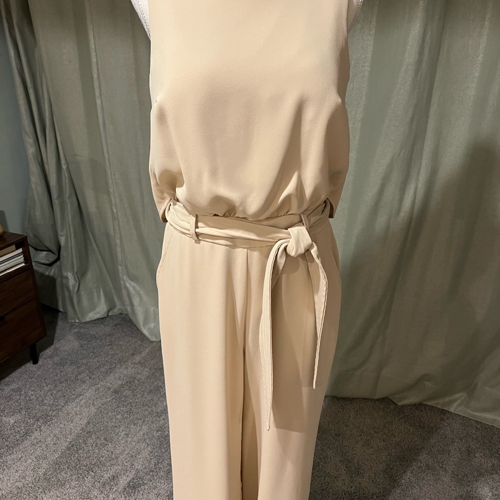 Striking Jumpsuit! Trina Turk belted jumpsuit with pockets. Beige. Size 4.